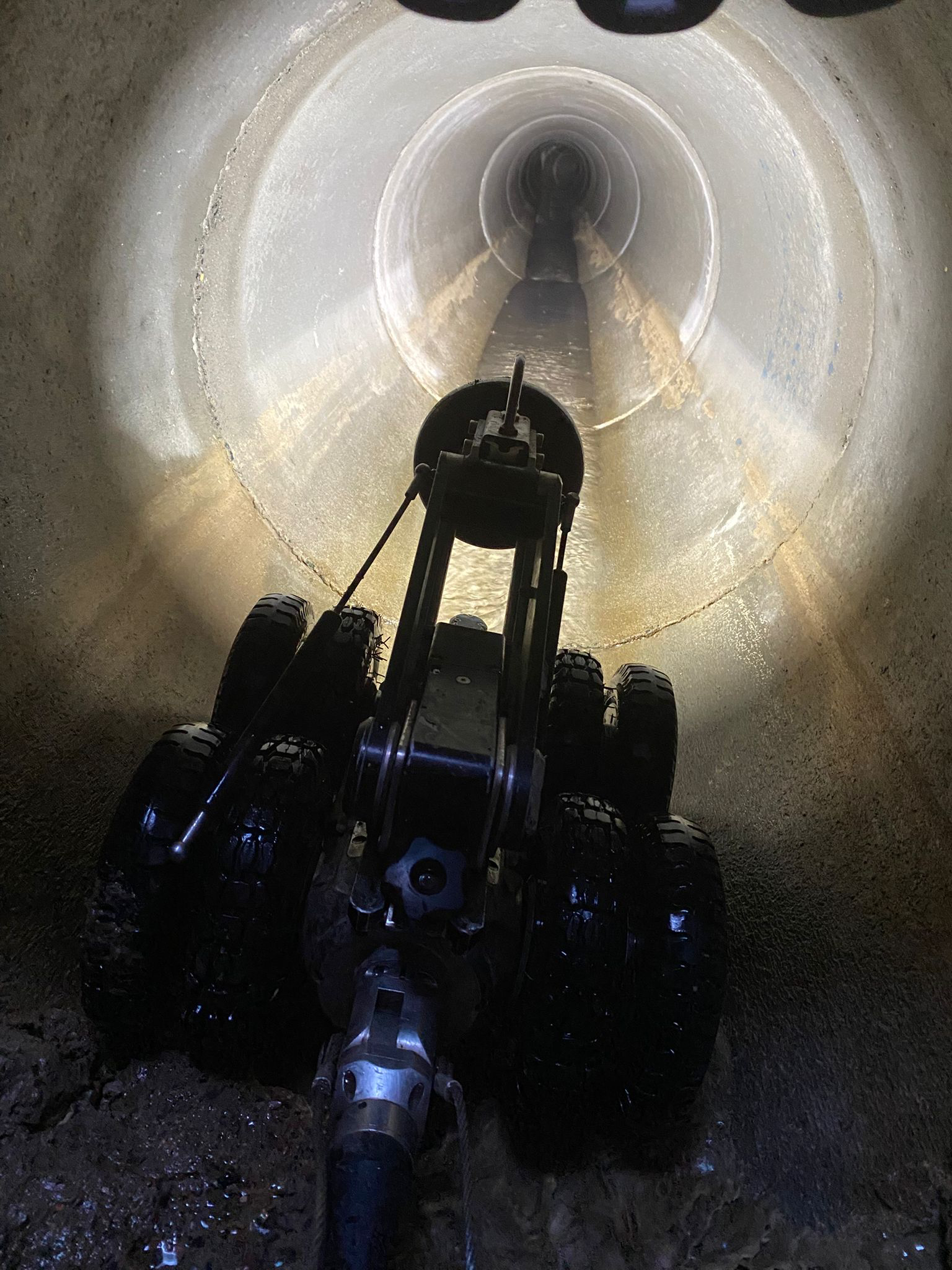 Remote CCTV crawler inspecting a drainage pipe